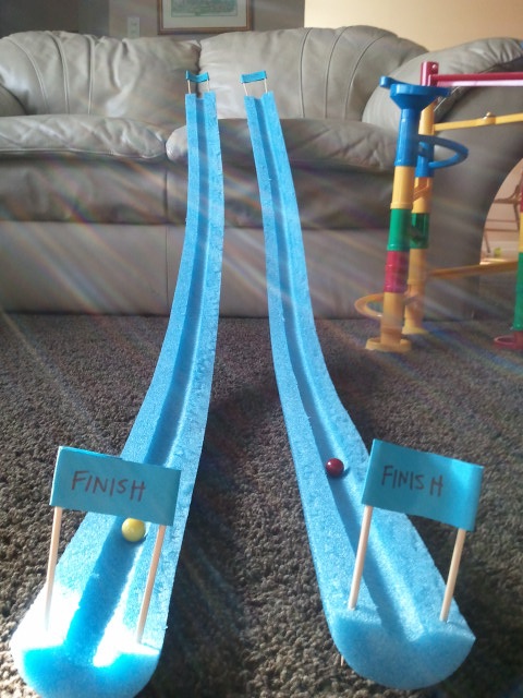 Pool noodle playroom organization idea