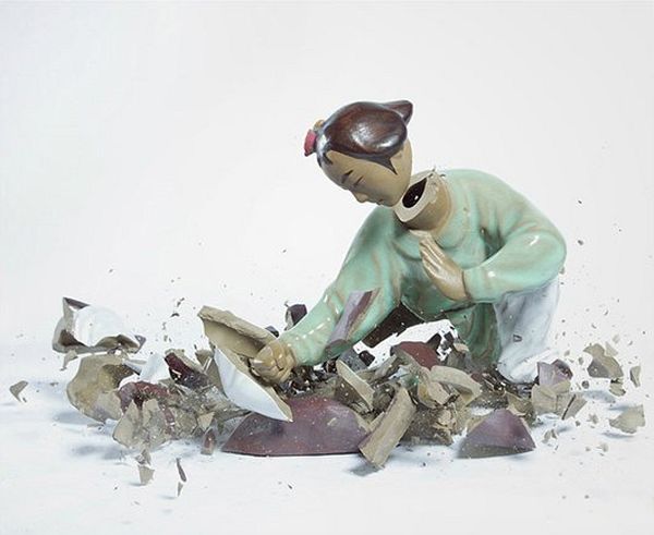 Porcelain figurine shards frozen in midair by Martin Klimas
