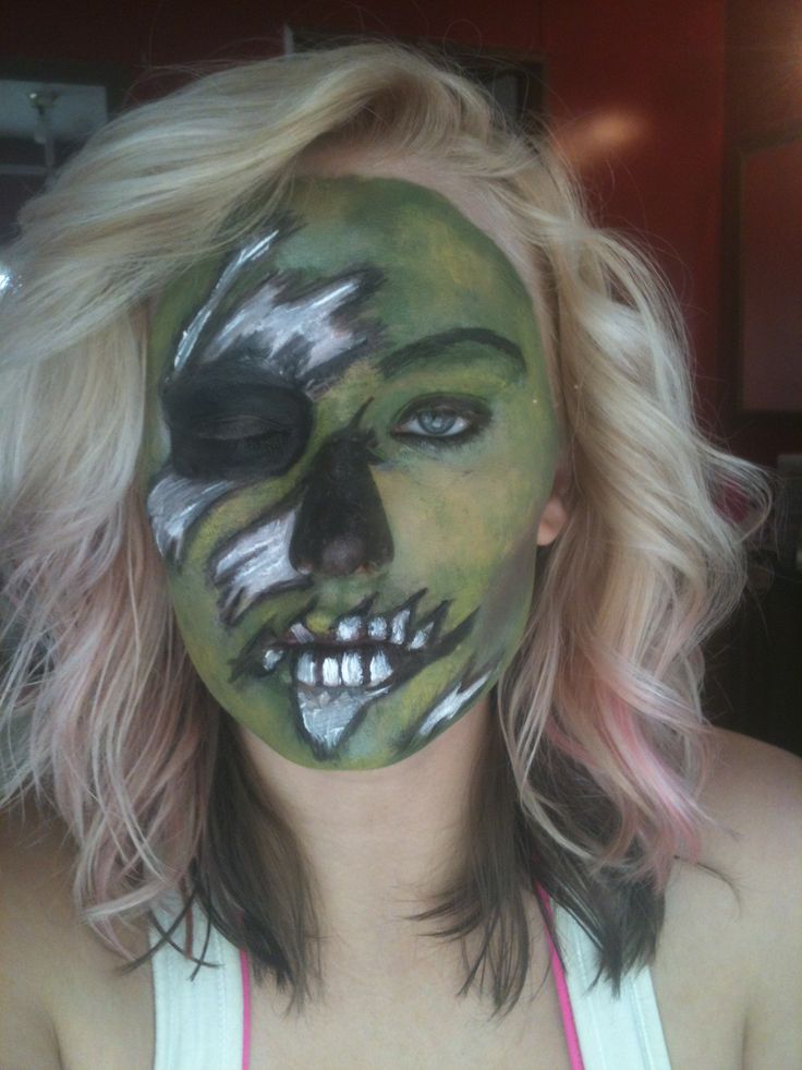 Green zombie skull hybrid half-distressed face paint
