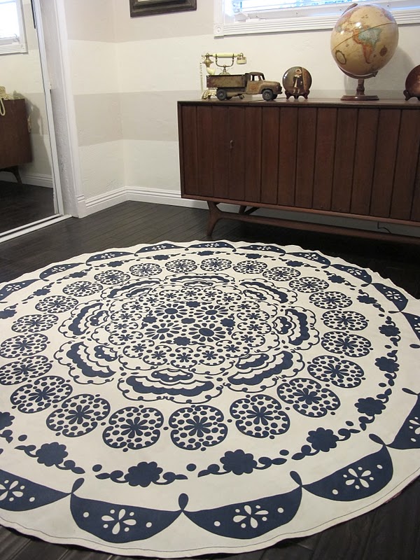 Tablecloth converted into a rug