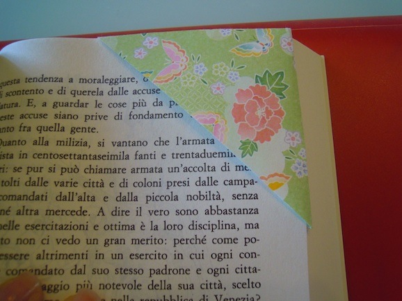 Origami bookmark folded from a greeting card